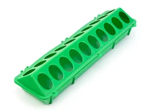 A green plastic poultry feeder with multiple circular openings for feeding.