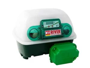 This is an image of an egg incubator. It has a white dome-shaped top and a green base. The front panel features a digital display and control knobs. There is also a green component attached to the front.