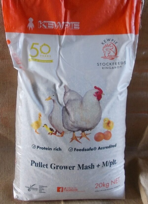 The image shows a bag of Kewpie Stockfeeds. The bag is labeled "Pullet Grower Mash + M/plt" and weighs 20 kg. It features illustrations of chickens and chicks, and includes text indicating it is "Protein rich" and "Feedsafe® Accredited." The bag also mentions "50 years" and has a logo with a rooster