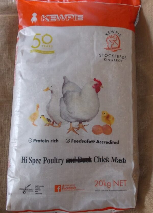 This is an image of a bag of Kewpie Stockfeeds. The bag features illustrations of a chicken, duck, and chicks, and it mentions "Hi Spec Poultry and Chick Mash." It highlights being "Protein rich" and "Feedsafe Accredited." The bag is marked as 20 kg NET.